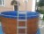 Морозоустойчивый бассейн 450х125см Лагуна круглый цвет дерево, лестница, фильтр насос, скиммер, песок